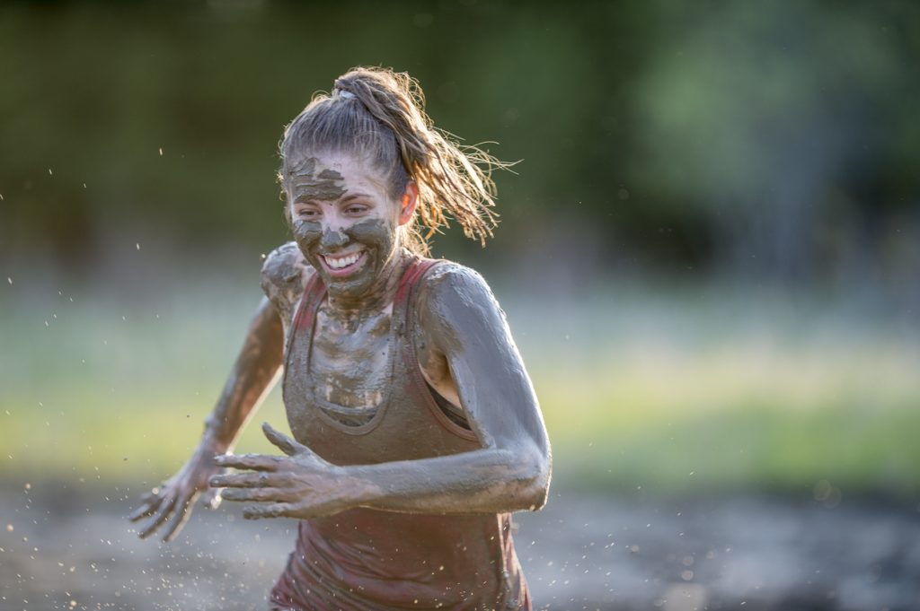 Woman Doing A Mud Run