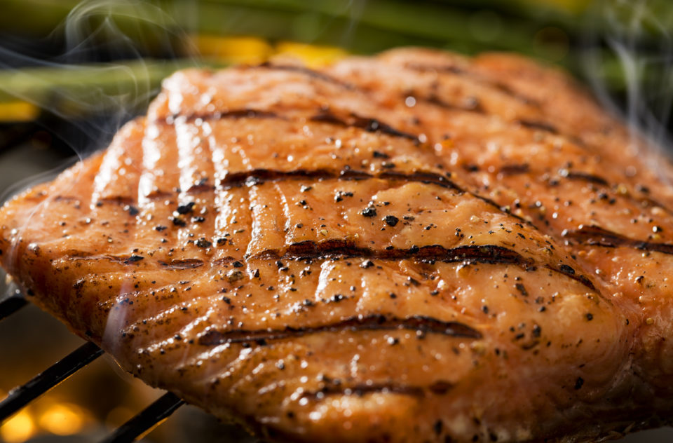 Grilled salmon on grill
