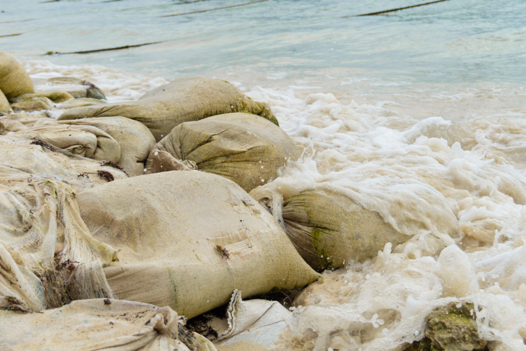 Sandbag for flood on the sea shore.